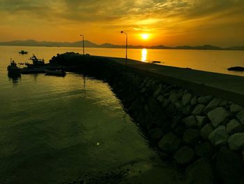 Scenic view of sea against sky during sunset