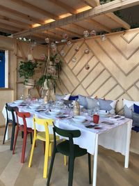 Empty chairs and tables in restaurant