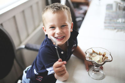 Boy eating dessert