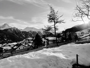 Scenic view of snow covered mountains against sky