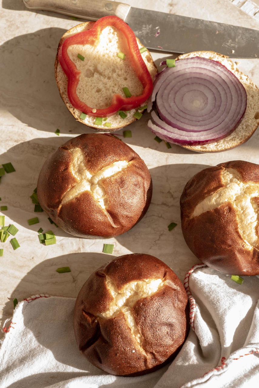 HIGH ANGLE VIEW OF BREAD WITH CHEESE ON TABLE