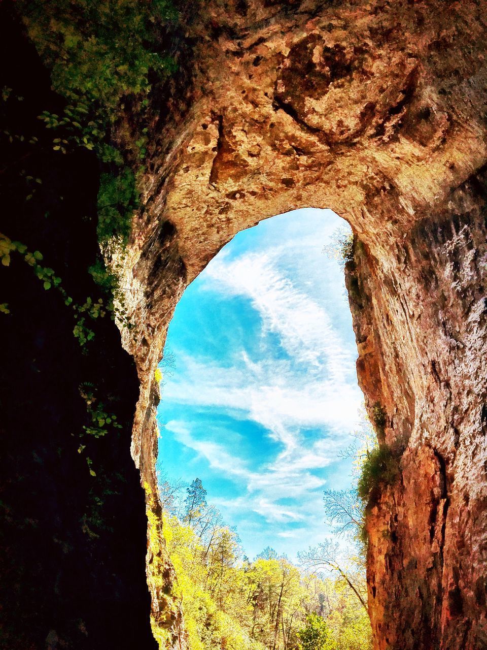 LOW ANGLE VIEW OF ROCK FORMATION AGAINST SKY