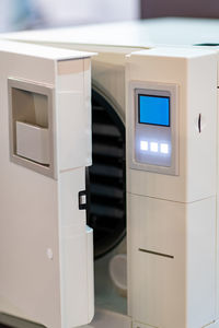 Sterilization desk with autoclave in a dental clinic. sterilization of dental medicine instruments.