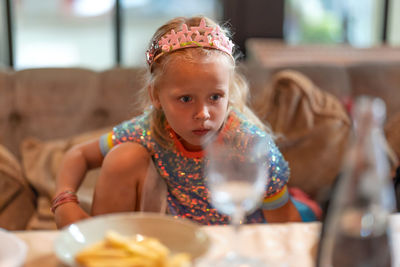 Portrait of cute girl at home