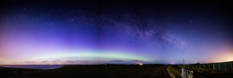 Scenic view of illuminated star field against sky at night