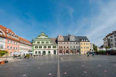 Group of people in front of building