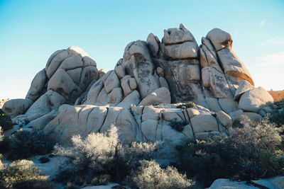 Scenic view of rocky mountains against sky