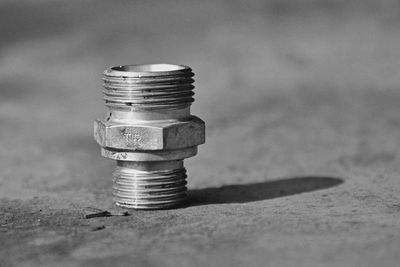 Close-up of coins on table