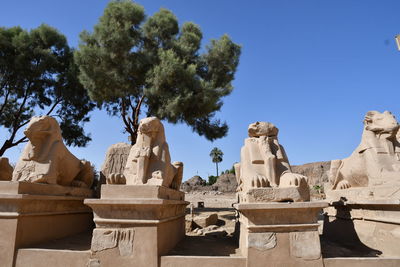 View of statues against sky