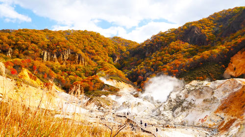 Scenic view of mountains against sky during autumn