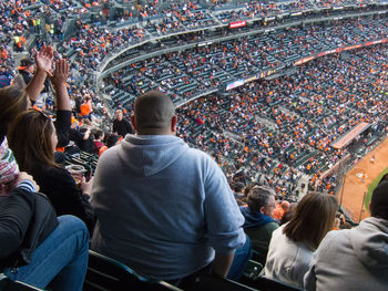 High angle view of people looking at crowd