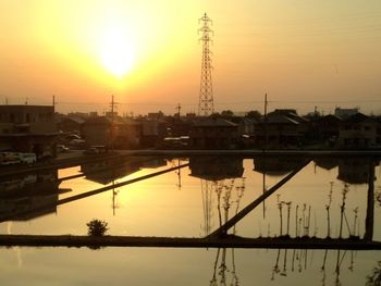 View of harbor at sunset