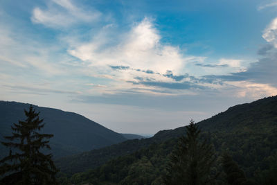 Scenic view of mountains against sky during sunset
