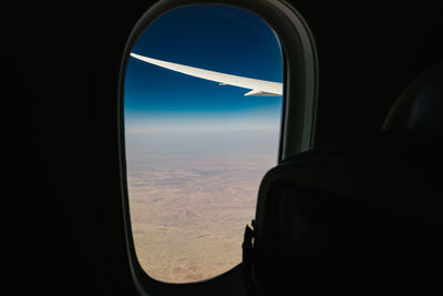 Cropped image of airplane wing