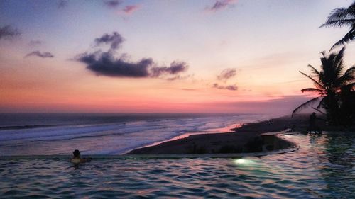 Scenic view of sea against sky during sunset