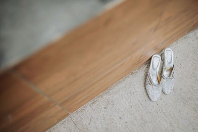 High angle view of wedding rings on table