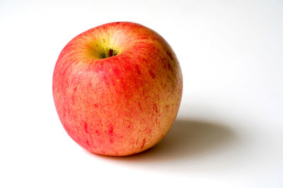 Close-up of apple against white background