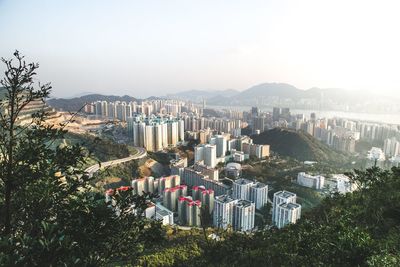 High angle view of buildings in city against clear sky