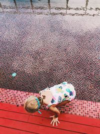 High angle view of woman on wall