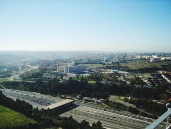 High angle view of buildings against clear sky