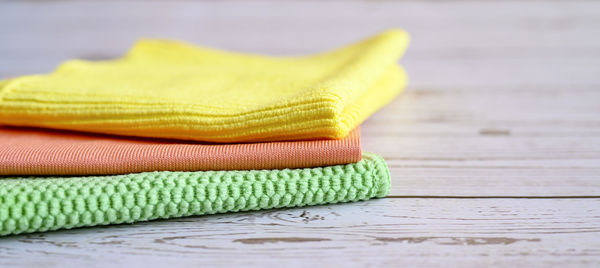 Close-up of yellow stack on table