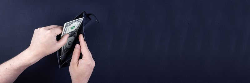 Close-up of person holding smart phone