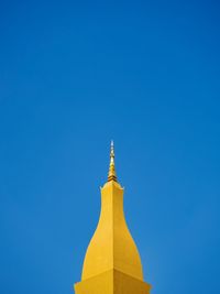 Low angle view of a building against blue sky