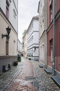 Footpath amidst residential buildings