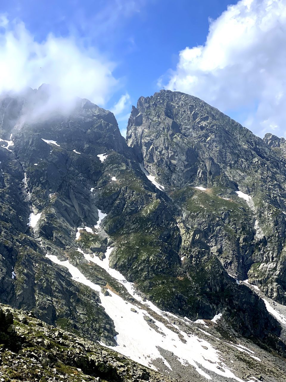 SCENIC VIEW OF SNOWCAPPED MOUNTAINS AGAINST SKY DURING WINTER