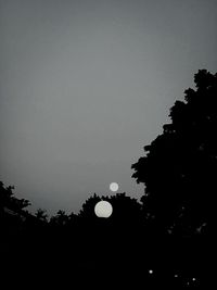 Low angle view of moon in sky