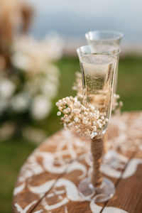 Close-up of wineglasses on table