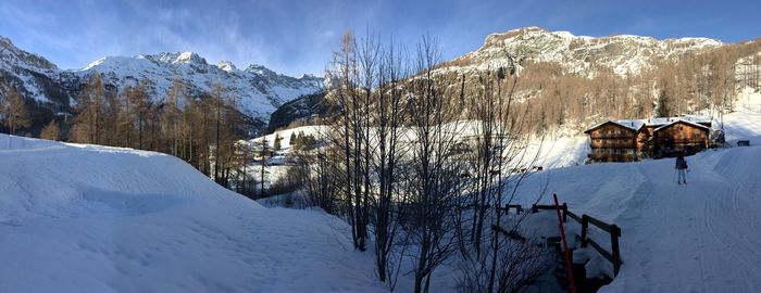 Scenic view of snowcapped mountains against sky