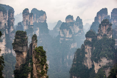 Panoramic view of rock formations against sky