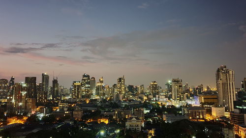 High angle view of illuminated buildings against sky