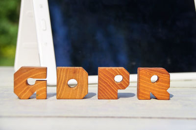 Close-up of wooden alphabets on table