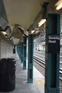 Interior of illuminated railroad station platform