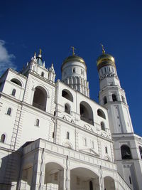 Low angle view of building against blue sky