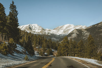 A sunny morning overlooking the rocky mountains in rocky mountain national park in colorado. 