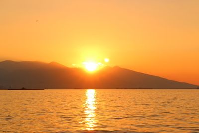 Scenic view of sunset over sea