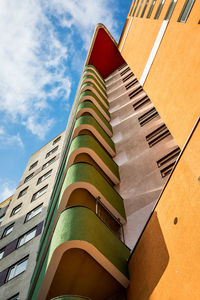 Low angle view of modern buildings against sky