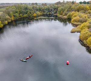 High angle view of lake against trees