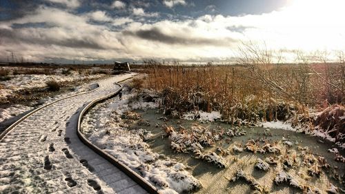 Railroad tracks against sky