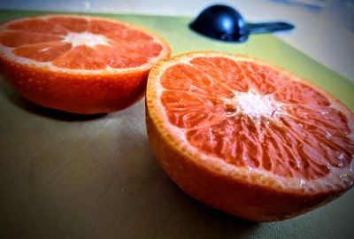 Close-up of orange slices on table