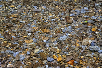 High angle view of stones on beach