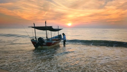 Scenic view of sea against sky during sunset