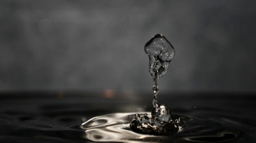 Close-up of water splashing in container