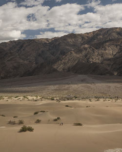 Sand against mountain