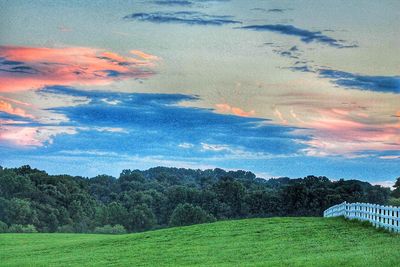 Scenic view of landscape against sky during sunset