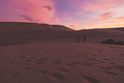 View of desert against scenic sky