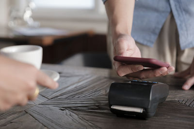 Paying bill through smartphone using nfc technology.